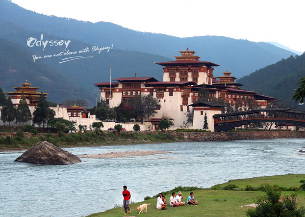 People enjoy leisure time near Punakha Dzong, located on the confluence of the Pho Chu and Mo Chu ri