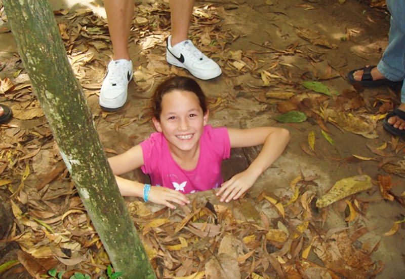 A Young Girl in Cu Chi Tunnels in Vietnam