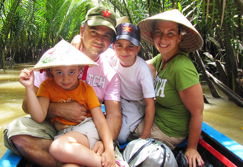 Happy Family Boat Ride in the Mekong 