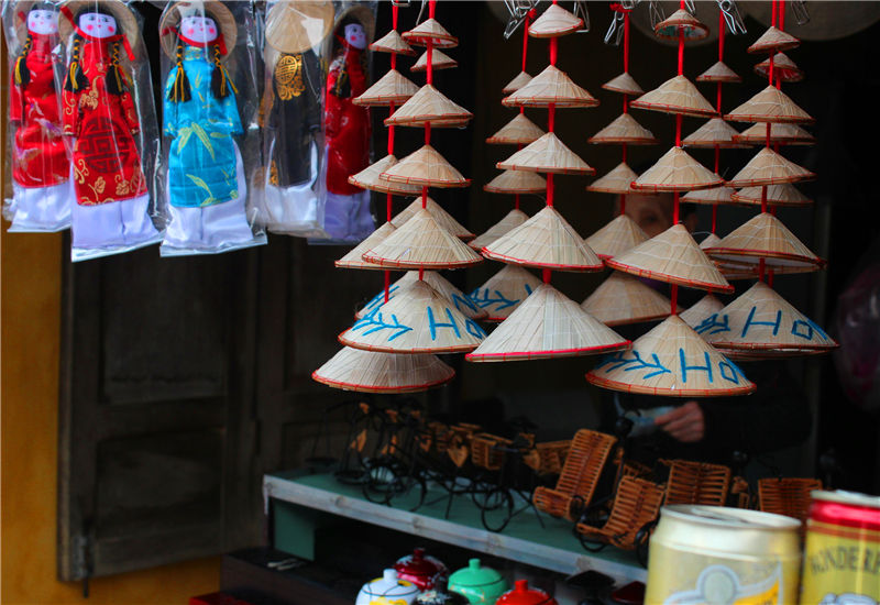 Street Shop in Vietnam Selling Conical Hats