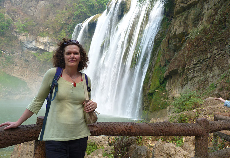 Mary Monro in the Huangguoshuo Waterfall in Guizou, China