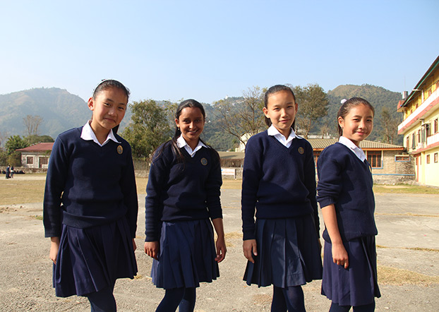 Smiling schoolgirls in Nepal