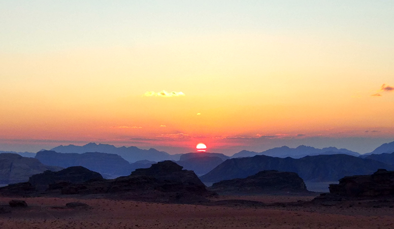 Enjoy the movie-set sunset unfolding in front of you in Wadi Rum, Jordan