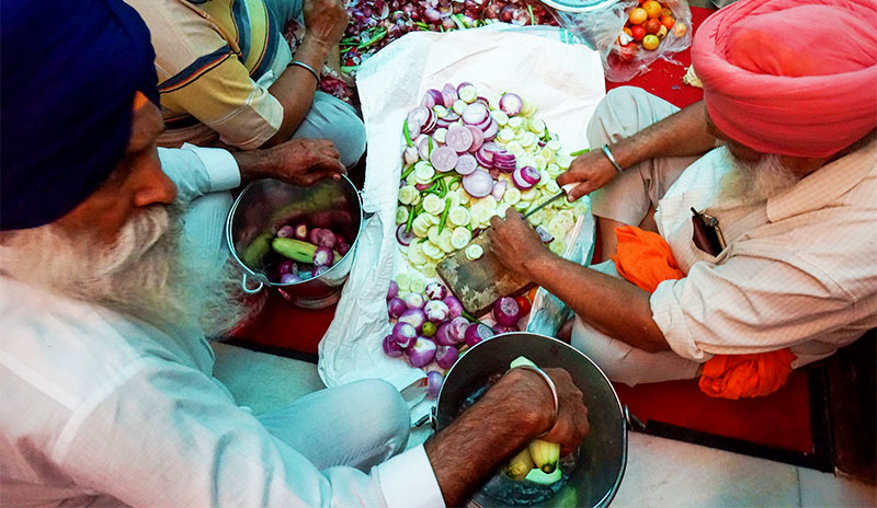 Volunteers preparing the vegetables at the community kitchen in the Golden Temple in Amritsar