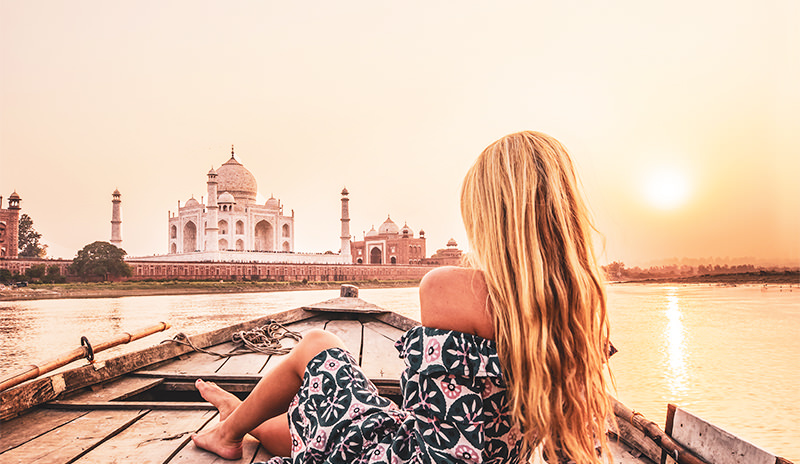 A Distant View of the Taj Mahal From a Boat on the Yamuna River