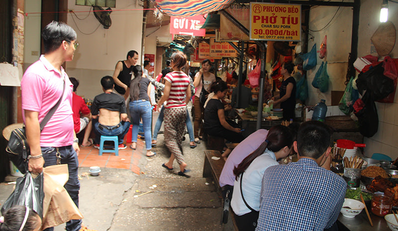 A typical small eats street in the Old Quarter