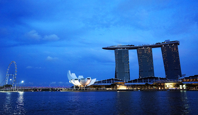 The Singapore Flyer (left) and the Marina Bay Sands Casino (right)