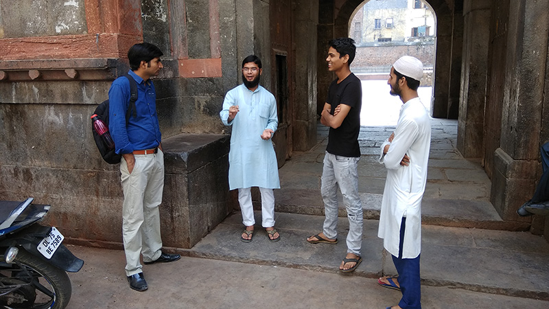 The trainer, Mr. Sudhir Dwivedi (on the far left), was teaching on a field trip.