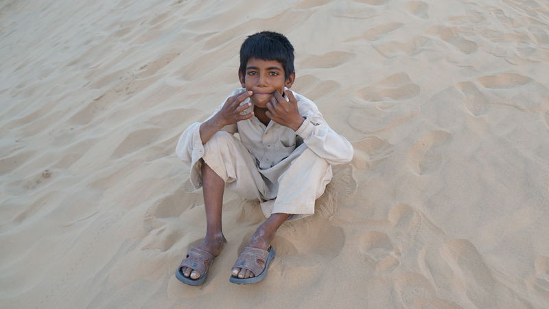 The Little Boy Who Led the Camel for Me