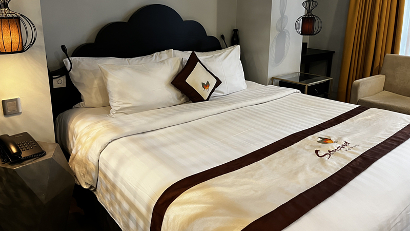 A Sanouva Deluxe Room in Sanouva Saigon Hotel