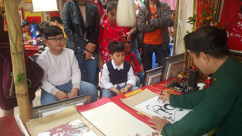 Calligraphy During Tet Festival