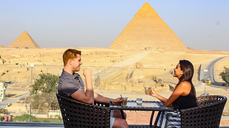 Coffee Time for Couple Near the Pyramids of Giza