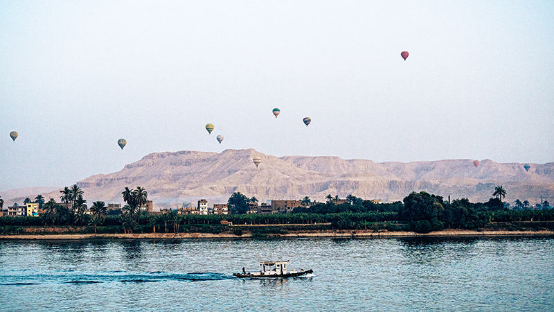 Hot Air Balloons Above the Nile River