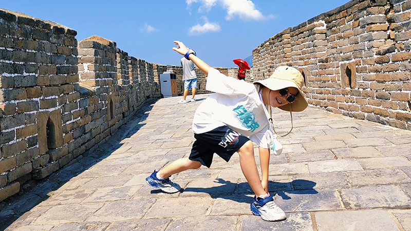 Our customer's kid playing on the great wall