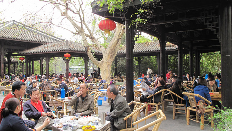 Local people have tea in People's Park