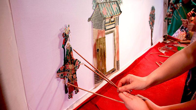 A shadow puppet show at Grand Gao's Mansion