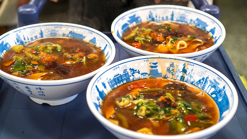 Three servings of beef noodles in Gansu