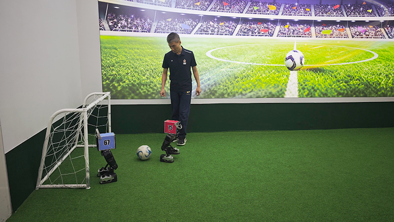 Play football with robots in a store in Guangzhou
