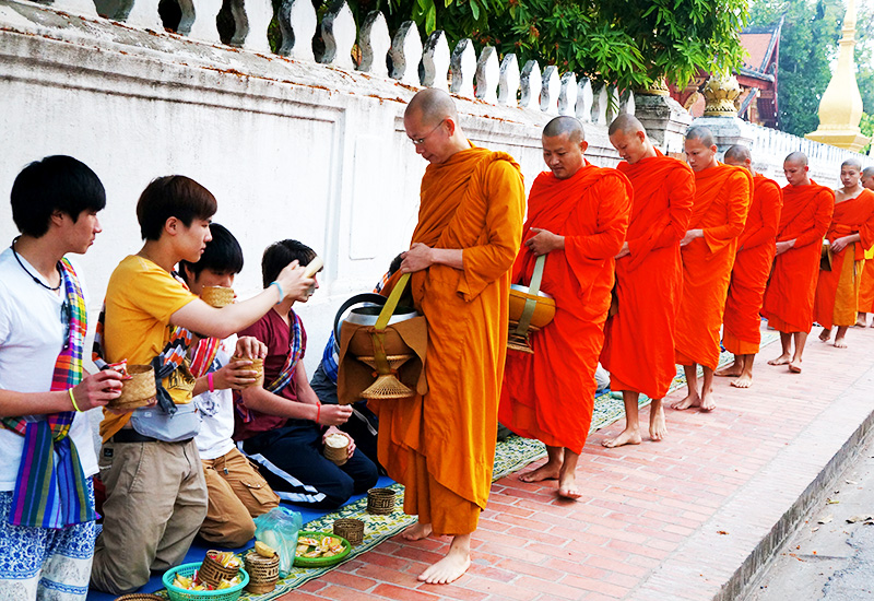 Alms giving ceremony in Luang Prabang