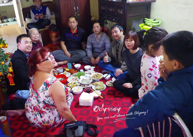 Odyssey guests enjoying Vietnamese New Year feast with a local family.