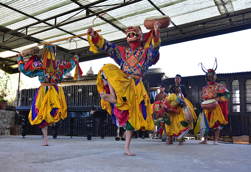 locals performing mask dance