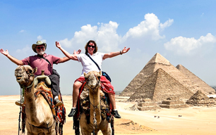Experience Camel Riding in Front of the Pyramids