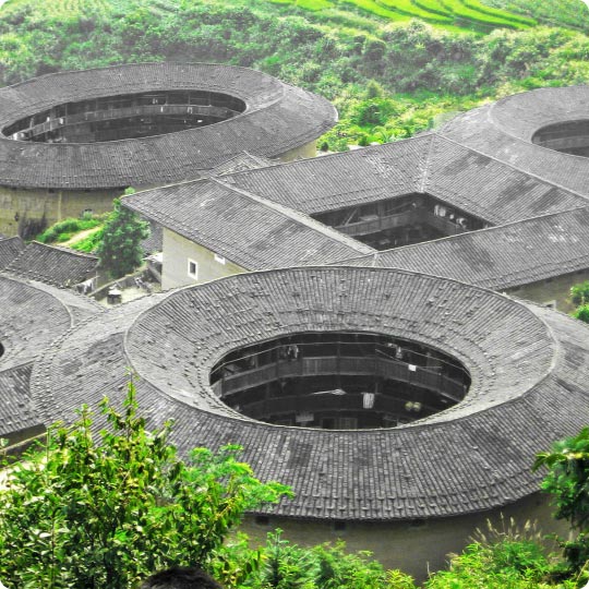 Tulou - a huge circular traditional building with military functions in ancient China.