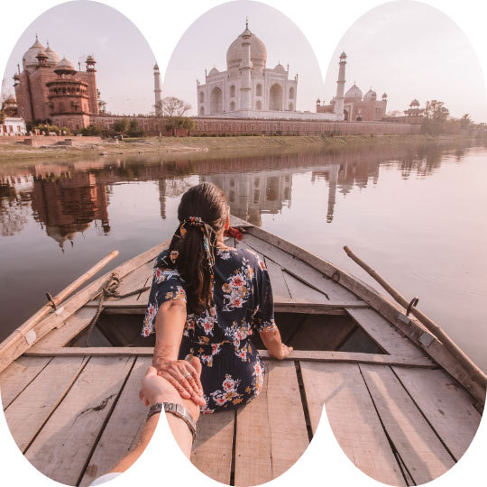 Drift along the Yamuna River with Taj Mahal as background