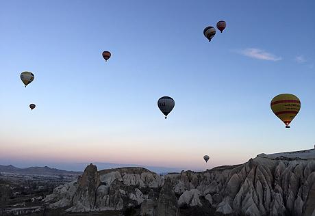 Hot air balloon toward the sunrise in Cappadocia, Turkey