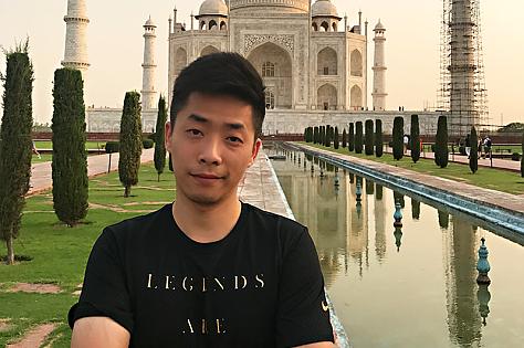 John is Infront of Taj Mahal in India