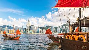 Victoria Harbor In Hong Kong With Vintage Ship