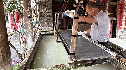 Ancient paper-making process in Shiqiao village, Guizhou