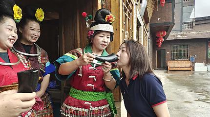 Welcome ceremony by Miao villagers,Guizhou